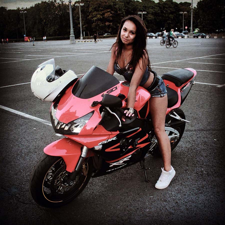 Brunettes on a motorcycle in Zibo